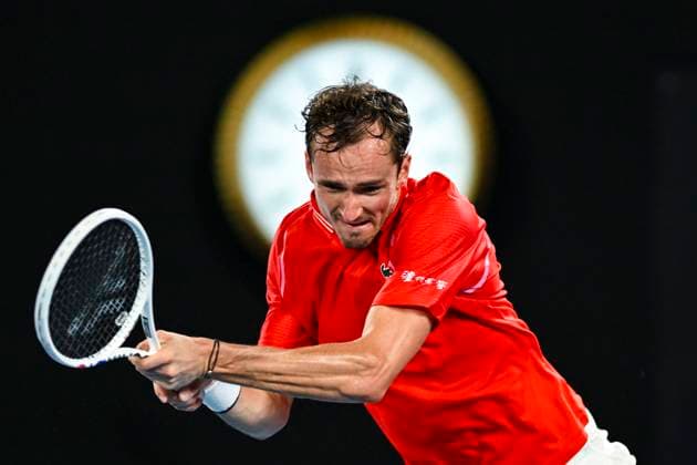 Sport Bilder des Tages TENNIS AUSTRALIAN OPEN, Daniil Medvedev of Russia returns during his Men?s Singles 1st Round match against Marcos Giron of the U.S. on Day 1 of the 2023 Australian Open tennis tournament at Melbourne Park in Melbourne, Monday, January 16, 2023. ( NO ARCHIVING, EDITORIAL USE ONLY, NO USE IN BOOKS WITHOUT CONSENT MELBOURNE VICTORIA AUSTRALIA  Copyright: xLUKASxCOCHx 20230116001753100366