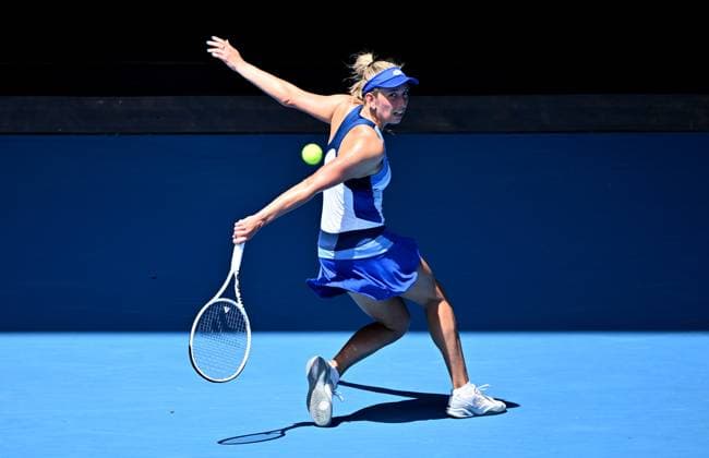 TENNIS AUSTRALIAN OPEN, Elise Mertens of Belgium returns to Garbine Muguruza of Spain during their first round singles match at the 2023 Australian Open tennis tournament at Melbourne Park in Melbourne, Tuesday, January 17, 2023. ( NO ARCHIVING, EDITORIAL USE ONLY, NO USE IN BOOKS WITHOUT CONSENT MELBOURNE VICTORIA AUSTRALIA  Copyright: xJOELxCARRETTx 20230117001753353403