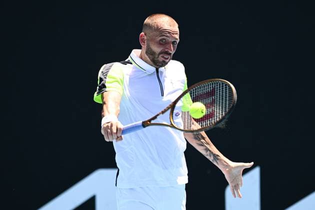Mandatory Credit: Photo by James Gourley Shutterstock (13716760d) Dan Evans in action during his first round match Australian Open, Day Two, Tennis, Melbourne Park, Melbourne, Australia - 17 Jan 2023 Australian Open, Day Two, Tennis, Melbourne Park, Melbourne, Australia - 17 Jan 2023 Copyright: xJamesxGourley Shutterstockx 13716760d