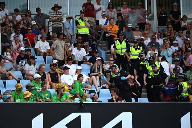 Sport Bilder des Tages TENNIS AUSTRALIAN OPEN, Police talk to spectators during the first round match with Jordan Thompson of Australia and JJ Wolf of the U.S. at the 2023 Australian Open tennis tournament at Melbourne Park in Melbourne, Tuesday, January 17, 2023. ( NO ARCHIVING, EDITORIAL USE ONLY, NO USE IN BOOKS WITHOUT CONSENT MELBOURNE VICTORIA AUSTRALIA  Copyright: xLUKASxCOCHx 20230117001753435955