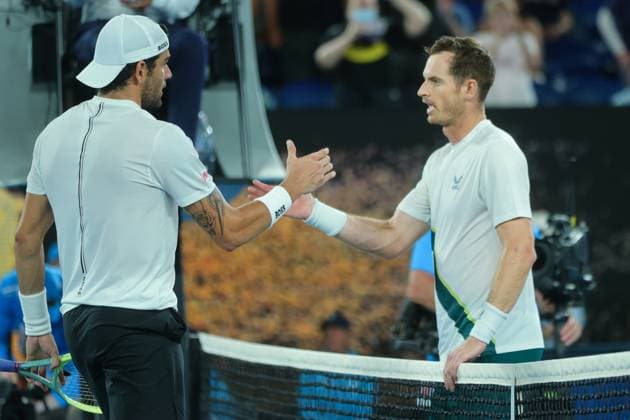 Andy Murray of Great Britain congratulates Matteo Berrettini of Italy at the net after defeating Matteo Berrettini of Italy 6-3 6-3 4-6 6-7 7-6 during round 1 match between Andy Murray of Great Britain and Matteo Berrettini of Italy Day 2 at the Australian Open Tennis 2023 at Rod Laver Arena, Melbourne, Australia on 17 January 2023. Copyright: xPeterxDovganx 34780491