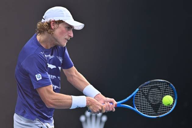 TENNIS AUSTRALIAN OPEN, Max Purcell of Australia returns during his 1st round singles match against Emil Ruusuvuori of Finland during 2023 Australian Open tennis tournament at Melbourne Park in Melbourne, Tuesday, January 17, 2023. ( NO ARCHIVING, EDITORIAL USE ONLY, NO USE IN BOOKS WITHOUT CONSENT MELBOURNE VICTORIA AUSTRALIA  Copyright: xJOELxCARRETTx 20230117001753457424