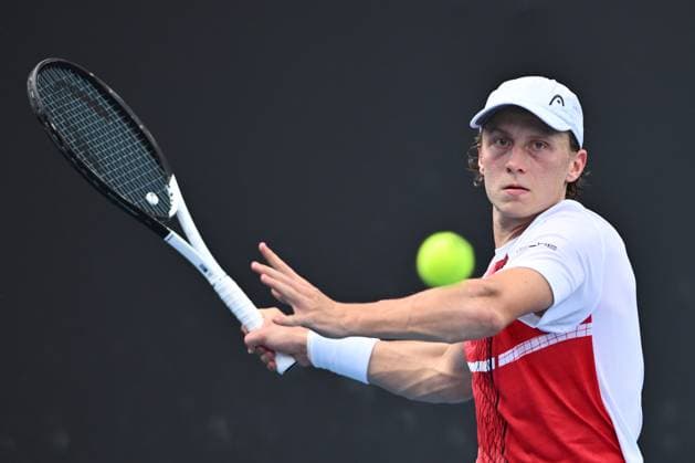 TENNIS AUSTRALIAN OPEN, Emil Ruusuvuori of Finland returns during his 1st round singles match against Max Purcell of Australia during 2023 Australian Open tennis tournament at Melbourne Park in Melbourne, Tuesday, January 17, 2023. ( NO ARCHIVING, EDITORIAL USE ONLY, NO USE IN BOOKS WITHOUT CONSENT MELBOURNE VICTORIA AUSTRALIA  Copyright: xJOELxCARRETTx 20230117001753460455