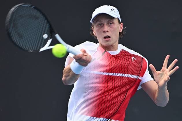 TENNIS AUSTRALIAN OPEN, Emil Ruusuvuori of Finland returns during his 1st round singles match against Max Purcell of Australia during 2023 Australian Open tennis tournament at Melbourne Park in Melbourne, Tuesday, January 17, 2023. ( NO ARCHIVING, EDITORIAL USE ONLY, NO USE IN BOOKS WITHOUT CONSENT MELBOURNE VICTORIA AUSTRALIA  Copyright: xJOELxCARRETTx 20230117001753460559