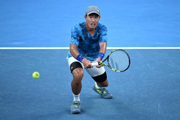 TENNIS AUSTRALIAN OPEN, Yu Hsiou Hsu of Hong Kong returns during his 1st round singles match against Alex de Minaur of Australia during 2023 Australian Open tennis tournament at Melbourne Park in Melbourne, Tuesday, January 17, 2023. ( NO ARCHIVING, EDITORIAL USE ONLY, NO USE IN BOOKS WITHOUT CONSENT MELBOURNE VICTORIA AUSTRALIA  Copyright: xJAMESxROSSx 20230117001753471899
