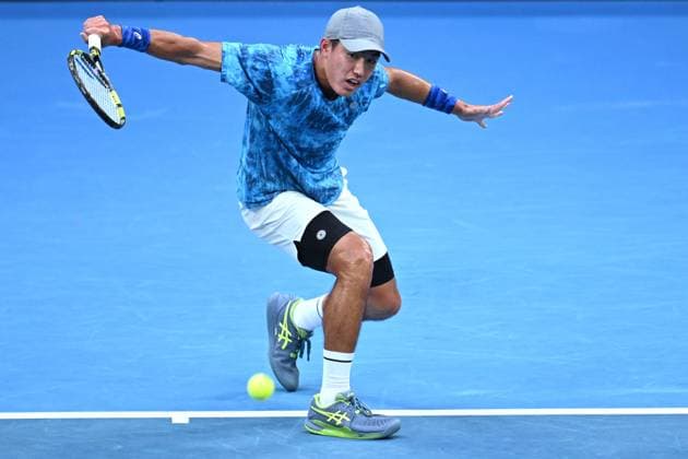 TENNIS AUSTRALIAN OPEN, Yu Hsiou Hsu of Hong Kong returns during his 1st round singles match against Alex de Minaur of Australia during 2023 Australian Open tennis tournament at Melbourne Park in Melbourne, Tuesday, January 17, 2023. ( NO ARCHIVING, EDITORIAL USE ONLY, NO USE IN BOOKS WITHOUT CONSENT MELBOURNE VICTORIA AUSTRALIA  Copyright: xJAMESxROSSx 20230117001753472078