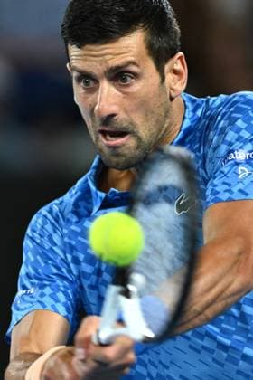 TENNIS AUSTRALIAN OPEN, Novak Djokovic of Serbia returns during his 1st round singles match against Roberto Carballes Baena of Spain during 2023 Australian Open tennis tournament at Melbourne Park in Melbourne, Tuesday, January 17, 2023. ( NO ARCHIVING, EDITORIAL USE ONLY, NO USE IN BOOKS WITHOUT CONSENT MELBOURNE VICTORIA AUSTRALIA  Copyright: xJOELxCARRETTx 20230117001753497375