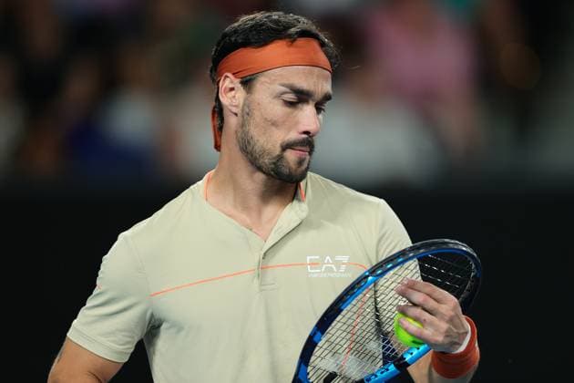 Fabio Fognini of Italy checks his strings during round 1 match between Thanasi Kokkinakis of Australia and Fabio Fognini of Italy Day 2 at the Australian Open Tennis 2023 at KIA Arena, Melbourne, Australia on 17 January 2023. Copyright: xPeterxDovganx 34780571