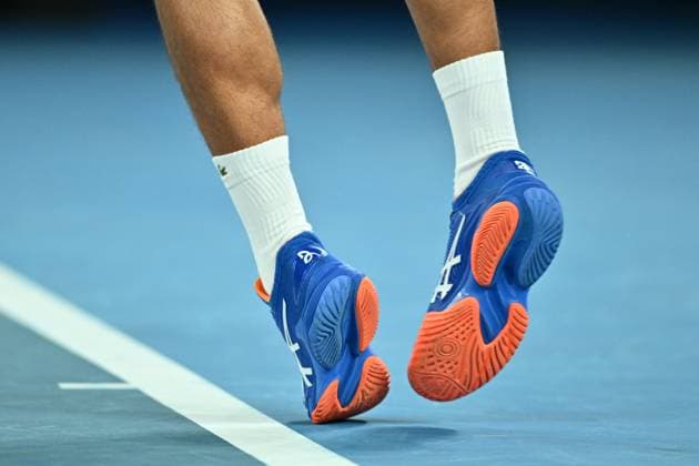 TENNIS AUSTRALIAN OPEN, Novak Djokovic of Serbia serves during his 1st round singles match against Roberto Carballes Baena of Spain during 2023 Australian Open tennis tournament at Melbourne Park in Melbourne, Tuesday, January 17, 2023. ( NO ARCHIVING, EDITORIAL USE ONLY, NO USE IN BOOKS WITHOUT CONSENT MELBOURNE VICTORIA AUSTRALIA  Copyright: xJOELxCARRETTx 20230117001753501151