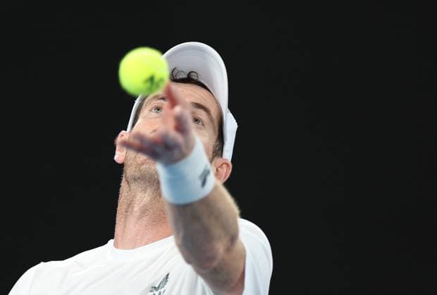 (230117) -- MELBOURNE, Jan. 17, 2023 -- Andy Murray of Britain serves during the men s singles 1st round match against Matteo Berrettini of Italy at Australian Open tennis tournament, in Melbourne, Australia, on Jan. 17, 2023. ) (SP)AUSTRALIA-MELBOURNE-TENNIS-AUSTRALIAN OPEN-DAY 2 BaixXuefei 