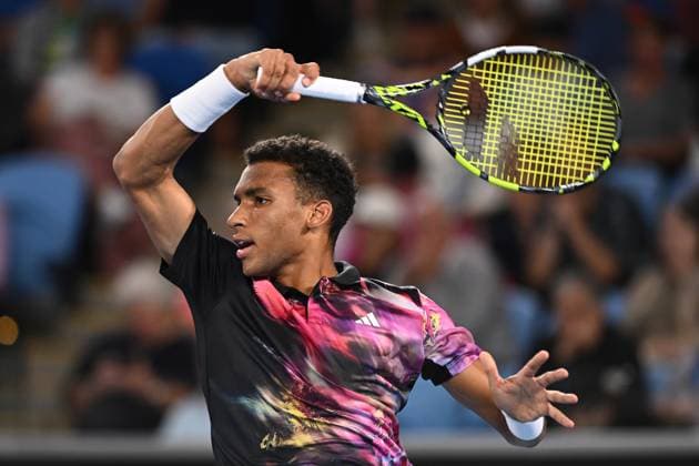 TENNIS AUSTRALIAN OPEN, Felix Auger-Aliassime of Canada in action against Alex Molcan of Slovakia during the 2023 Australian Open tennis tournament at Melbourne Park in Melbourne, Wednesday, January 18, 2023. ( NO ARCHIVING, EDITORIAL USE ONLY, NO USE IN BOOKS WITHOUT CONSENT MELBOURNE VICTORIA AUSTRALIA  Copyright: xJOELxCARRETTx 20230118001753722937