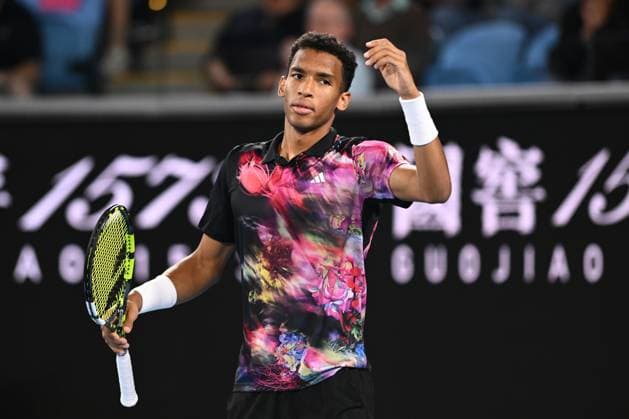 TENNIS AUSTRALIAN OPEN, Felix Auger-Aliassime of Canada reacts during his match against Alex Molcan of Slovakia during the 2023 Australian Open tennis tournament at Melbourne Park in Melbourne, Wednesday, January 18, 2023. ( NO ARCHIVING, EDITORIAL USE ONLY, NO USE IN BOOKS WITHOUT CONSENT MELBOURNE VICTORIA AUSTRALIA  Copyright: xJOELxCARRETTx 20230118001753722970