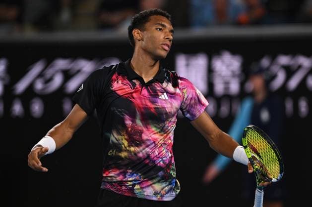 TENNIS AUSTRALIAN OPEN, Felix Auger-Aliassime of Canada reacts during his match against Alex Molcan of Slovakia during the 2023 Australian Open tennis tournament at Melbourne Park in Melbourne, Wednesday, January 18, 2023. ( NO ARCHIVING, EDITORIAL USE ONLY, NO USE IN BOOKS WITHOUT CONSENT MELBOURNE VICTORIA AUSTRALIA  Copyright: xJOELxCARRETTx 20230118001753742704