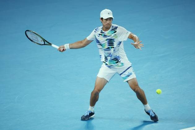 TENNIS AUSTRALIAN OPEN, Mackenzie McDonald of the USA in action during his match against Rafael Nadal of Spain during the 2023 Australian Open tennis tournament at Melbourne Park in Melbourne, Wednesday, January 18, 2023. ( NO ARCHIVING, EDITORIAL USE ONLY, NO USE IN BOOKS WITHOUT CONSENT MELBOURNE VICTORIA AUSTRALIA  Copyright: xDIEGOxFEDELEx 20230118001753758394