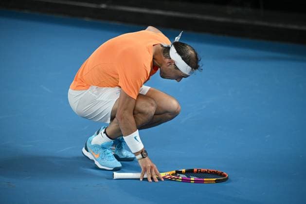TENNIS AUSTRALIAN OPEN, Rafael Nadal of Spain grimaces in pain during his match against Mackenzie McDonald of the USA during the 2023 Australian Open tennis tournament at Melbourne Park in Melbourne, Wednesday, January 18, 2023. ( NO ARCHIVING, EDITORIAL USE ONLY, NO USE IN BOOKS WITHOUT CONSENT MELBOURNE VICTORIA AUSTRALIA  Copyright: xDIEGOxFEDELEx 20230118001753761587