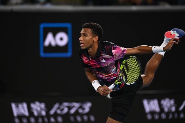 TENNIS AUSTRALIAN OPEN, Felix Auger-Aliassime of Canada in action during his match against Alex Molcan of Slovakia during the 2023 Australian Open tennis tournament at Melbourne Park in Melbourne, Wednesday, January 18, 2023. ( NO ARCHIVING, EDITORIAL USE ONLY, NO USE IN BOOKS WITHOUT CONSENT MELBOURNE VICTORIA AUSTRALIA  Copyright: xJOELxCARRETTx 20230118001753762456