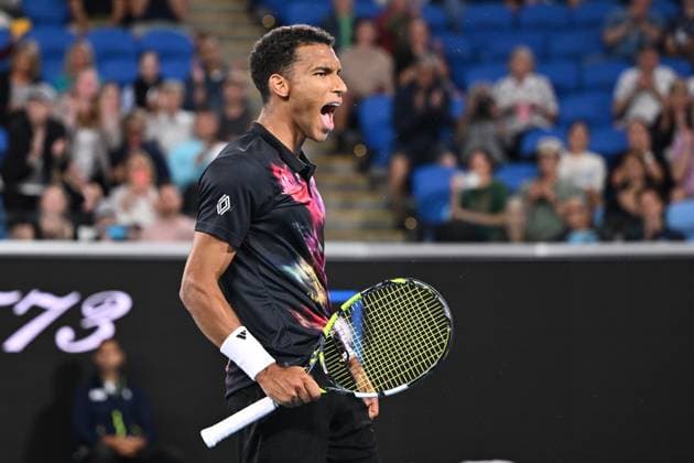 TENNIS AUSTRALIAN OPEN, Felix Auger-Aliassime of Canada celebrates defeating Alex Molcan of Slovakia during the 2023 Australian Open tennis tournament at Melbourne Park in Melbourne, Wednesday, January 18, 2023. ( NO ARCHIVING, EDITORIAL USE ONLY, NO USE IN BOOKS WITHOUT CONSENT MELBOURNE VICTORIA AUSTRALIA  Copyright: xJOELxCARRETTx 20230118001753771053