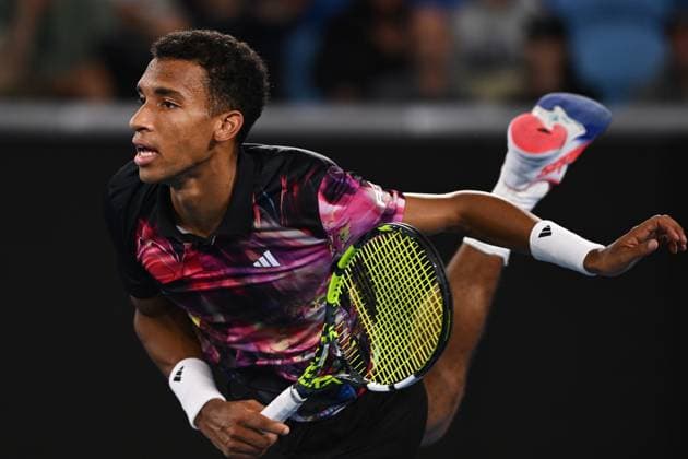 TENNIS AUSTRALIAN OPEN, Felix Auger-Aliassime of Canada serves during his match against Alex Molcan of Slovakia during the 2023 Australian Open tennis tournament at Melbourne Park in Melbourne, Wednesday, January 18, 2023. ( NO ARCHIVING, EDITORIAL USE ONLY, NO USE IN BOOKS WITHOUT CONSENT MELBOURNE VICTORIA AUSTRALIA  Copyright: xLUKASxCOCHx 20230118001753771508