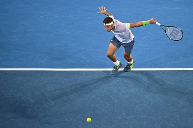 TENNIS AUSTRALIAN OPEN, Alex Molcan of Slovakia in action against Felix Auger-Aliassime of Canada during the 2023 Australian Open tennis tournament at Melbourne Park in Melbourne, Wednesday, January 18, 2023. ( NO ARCHIVING, EDITORIAL USE ONLY, NO USE IN BOOKS WITHOUT CONSENT MELBOURNE VICTORIA AUSTRALIA  Copyright: xJOELxCARRETTx 20230118001753774583