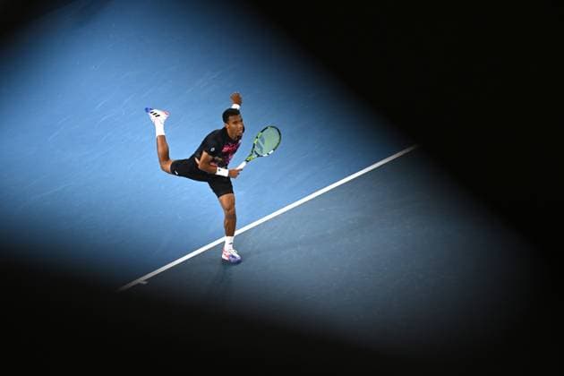 TENNIS AUSTRALIAN OPEN, Felix Auger-Aliassime of Canada serves during his match against Alex Molcan of Slovakia during the 2023 Australian Open tennis tournament at Melbourne Park in Melbourne, Wednesday, January 18, 2023. ( NO ARCHIVING, EDITORIAL USE ONLY, NO USE IN BOOKS WITHOUT CONSENT MELBOURNE VICTORIA AUSTRALIA  Copyright: xLUKASxCOCHx 20230118001753781833