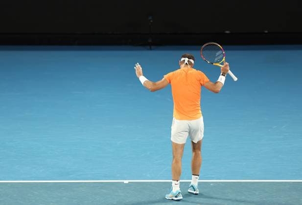 (230118) -- MELBOURNE, Jan. 18, 2023 -- Rafael Nadal of Spain reacts during the men s singles 2nd round match against Mackenzie McDonald of the United States at Australian Open tennis tournament in Melbourne, Australia, on Jan. 18, 2023. ) (SP)AUSTRALIA-MELBOURNE-TENNIS-AUSTRALIAN OPEN-DAY 3 BaixXuefei 