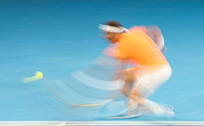 (230118) -- MELBOURNE, Jan. 18, 2023 -- Rafael Nadal of Spain hits a return during the men s singles 2nd round match against Mackenzie McDonald of the United States at Australian Open tennis tournament in Melbourne, Australia, on Jan. 18, 2023. ) (SP)AUSTRALIA-MELBOURNE-TENNIS-AUSTRALIAN OPEN-DAY 3 BaixXuefei 