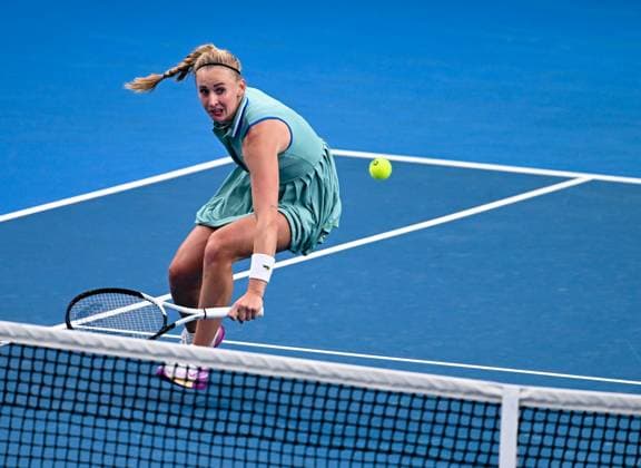 (230118) -- MELBOURNE, Jan. 18, 2023 -- Jil Teichmann of Switzerland hits a return during the women s singles second round match against Zhu Lin of China at Australian Open tennis tournament in Melbourne, Australia, on Jan. 18, 2023. ) (SP)AUSTRALIA-MELBOURNE-TENNIS-AUSTRALIAN OPEN-DAY 3 GuoxLei 