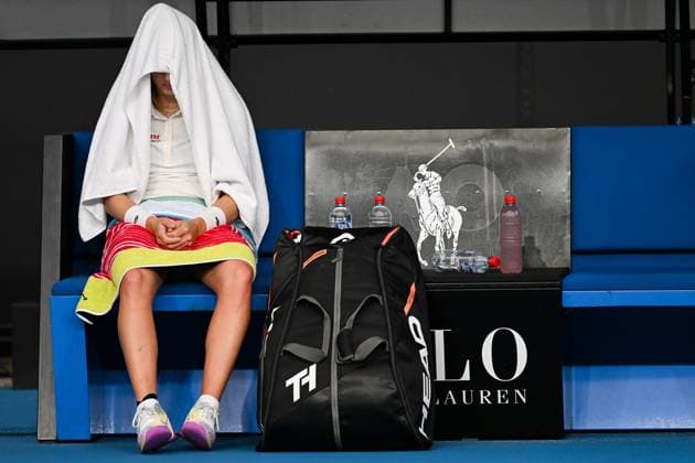 (230118) -- MELBOURNE, Jan. 18, 2023 -- Jil Teichmann of Switzerland rests during the women s singles second round match against Zhu Lin of China at Australian Open tennis tournament in Melbourne, Australia, on Jan. 18, 2023. ) (SP)AUSTRALIA-MELBOURNE-TENNIS-AUSTRALIAN OPEN-DAY 3 GuoxLei 