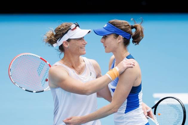 January 19, 2023, Melbourne, Australia: SAMANTHA STOSUR (L) embraces her doubles partner AIIZE CORNET of France after losing her match and retires from professional tennis after playing a match against 11th seed Zhaoxuan Yang of China and Hao-Ching Chan of Taipei in the 1st round Women s Doubles match on day 4 of the 2023 Australian Open on Kia Arena in Melbourne. Melbourne Australia - ZUMAc04_ 20230119_zaf_c04_001 Copyright: xSydneyxLowx