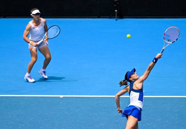 (230119) -- MELBOURNE, Jan. 19, 2023 -- Alize Cornet (R) Samantha Stosur compete during the women s doubles 1st round match between Yang Zhaoxuan (China) Chan Hao-Ching (Chinese Taipei) and Alize Cornet (France) Samantha Stosur (Australia) at Australian Open tennis tournament in Melbourne, Australia, on Jan. 19, 2023. ) (SP)AUSTRALIA-MELBOURNE-TENNIS-AUSTRALIAN OPEN-DAY 4 GuoxLei 