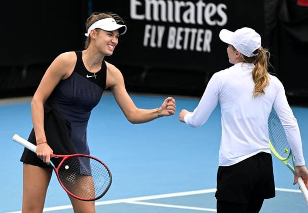 (230119) -- MELBOURNE, Jan. 19, 2023 -- Tereza Mihalikova (L) Aliaksandra Sasnovich react during the women s doubles 1st round match between Han Xinyun (China) Lidziya Marozava (Belarus) and Tereza Mihalikova (Slovakia) Aliaksandra Sasnovich (Belarus) at Australian Open tennis tournament in Melbourne, Australia, on Jan. 19, 2023. ) (SP)AUSTRALIA-MELBOURNE-TENNIS-AUSTRALIAN OPEN-DAY 4 GuoxLei 