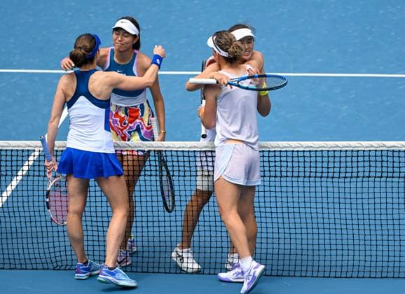 (230119) -- MELBOURNE, Jan. 19, 2023 -- Alize Cornet, Chan Hao-Ching, Samantha Stosur and Yang Zhaoxuan (L to R) react after the women s doubles 1st round match between Yang Zhaoxuan (China) Chan Hao-Ching (Chinese Taipei) and Alize Cornet (France) Samantha Stosur (Australia) at Australian Open tennis tournament in Melbourne, Australia, on Jan. 19, 2023. ) (SP)AUSTRALIA-MELBOURNE-TENNIS-AUSTRALIAN OPEN-DAY 4 GuoxLei 