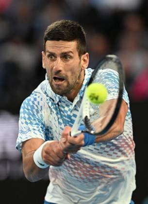 TENNIS AUSTRALIAN OPEN, Novak Djokorvic of Serbia returns during his second round match against Enzo Couacaud of France during the 2023 Australian Open tennis tournament at Melbourne Park in Melbourne, Thursday, January 19, 2023. ( NO ARCHIVING, EDITORIAL USE ONLY, NO USE IN BOOKS WITHOUT CONSENT MELBOURNE VICTORIA AUSTRALIA  Copyright: xLUKASxCOCHx 20230119001754250878