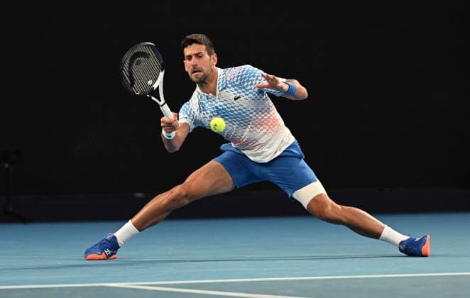 TENNIS AUSTRALIAN OPEN, Novak Djokorvic of Serbia returns during his second round match against Enzo Couacaud of France during the 2023 Australian Open tennis tournament at Melbourne Park in Melbourne, Thursday, January 19, 2023. ( NO ARCHIVING, EDITORIAL USE ONLY, NO USE IN BOOKS WITHOUT CONSENT MELBOURNE VICTORIA AUSTRALIA  Copyright: xLUKASxCOCHx 20230119001754252113