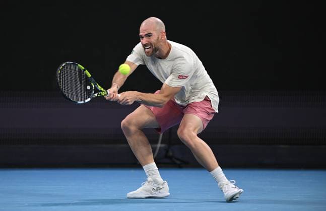 TENNIS AUSTRALIAN OPEN, Adrian Mannarino of France returns during his second round match against Alex De Minaur of Australia at the 2023 Australian Open tennis tournament at Melbourne Park in Melbourne, Thursday, January 19, 2023. ( NO ARCHIVING, EDITORIAL USE ONLY, NO USE IN BOOKS WITHOUT CONSENT MELBOURNE VICTORIA AUSTRALIA  Copyright: xJAMESxROSSx 20230119001754265725
