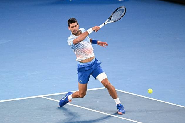 Mandatory Credit: Photo by James Gouley Shutterstock (13716770du) Novak Djokovic in action during his second round match Australian Open, Day Four, Tennis, Melbourne Park, Melbourne, Australia - 19 Jan 2023 Australian Open, Day Four, Tennis, Melbourne Park, Melbourne, Australia - 19 Jan 2023 Copyright: xJamesxGouley Shutterstockx 13716770du