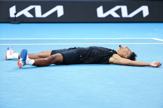 (230119) -- MELBOURNE, Jan. 19, 2023 -- Michael Mmoh of the United States reacts after winning the men s singles second round match against Germany s Alexander Zverev at Australian Open tennis tournament in Melbourne, Australia, on Jan. 19, 2023. ) (SP)AUSTRALIA-MELBOURNE-TENNIS-AUSTRALIAN OPEN-DAY 4 BaixXuefei 