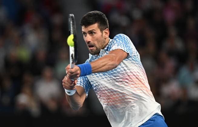 TENNIS AUSTRALIAN OPEN, Novak Djokorvic of Serbia returns to Enzo Couacaud of France during their second round match at the 2023 Australian Open tennis tournament at Melbourne Park in Melbourne, Thursday, January 19, 2023. ( NO ARCHIVING, EDITORIAL USE ONLY, NO USE IN BOOKS WITHOUT CONSENT MELBOURNE VICTORIA AUSTRALIA  Copyright: xLUKASxCOCHx 20230119001754274885