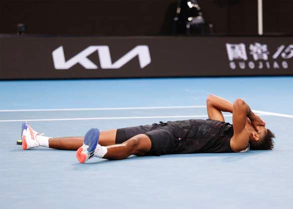 Michael Mmoh cheers after victory, jubilation, joy, emotion,lies on the ground, Australian Open 2023, Melbourne Park, Melbourne, Victoria, Australia Copyright: xJuergenxHasenkopfx