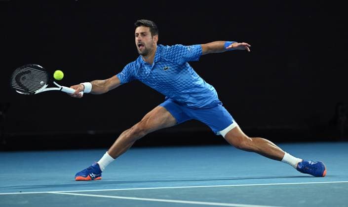 TENNIS AUSTRALIAN OPEN, Novak Djokorvic of Serbia returns during his second round match against Enzo Couacaud of France at the 2023 Australian Open tennis tournament at Melbourne Park in Melbourne, Thursday, January 19, 2023. ( NO ARCHIVING, EDITORIAL USE ONLY, NO USE IN BOOKS WITHOUT CONSENT MELBOURNE VICTORIA AUSTRALIA  Copyright: xLUKASxCOCHx 20230119001754298460