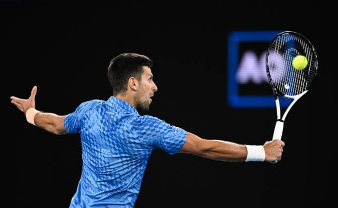 Mandatory Credit: Photo by James Gouley Shutterstock (13716770ev) Novak Djokovic in action during his second round match Australian Open, Day Four, Tennis, Melbourne Park, Melbourne, Australia - 19 Jan 2023 Australian Open, Day Four, Tennis, Melbourne Park, Melbourne, Australia - 19 Jan 2023 Copyright: xJamesxGouley Shutterstockx 13716770ev