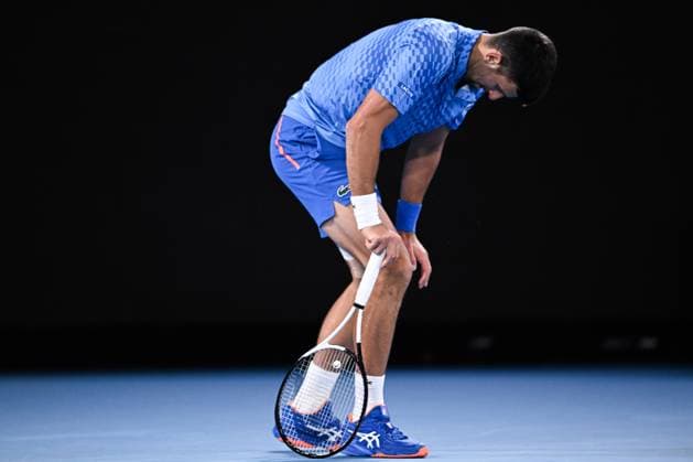 Mandatory Credit: Photo by James Gouley Shutterstock (13716770fq) Novak Djokovic limps during his second round match Australian Open, Day Four, Tennis, Melbourne Park, Melbourne, Australia - 19 Jan 2023 Australian Open, Day Four, Tennis, Melbourne Park, Melbourne, Australia - 19 Jan 2023 Copyright: xJamesxGouley Shutterstockx 13716770fq