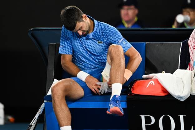 Mandatory Credit: Photo by James Gouley Shutterstock (13716770ew) Novak Djokovic applies cream during his second round match Australian Open, Day Four, Tennis, Melbourne Park, Melbourne, Australia - 19 Jan 2023 Australian Open, Day Four, Tennis, Melbourne Park, Melbourne, Australia - 19 Jan 2023 Copyright: xJamesxGouley Shutterstockx 13716770ew