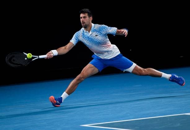 (230119) -- MELBOURNE, Jan. 19, 2023 -- Novak Djokovic of Serbia competes during the men s singles second round match against Enzo Couacaud of France at Australian Open tennis tournament in Melbourne, Australia, on Jan. 19, 2023. (Xjavascript:;inhua ) (SP)AUSTRALIA-MELBOURNE-TENNIS-AUSTRALIAN OPEN-DAY 4 GuoxLei 