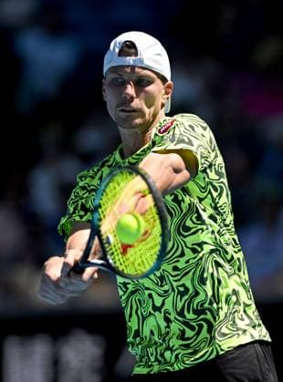 TENNIS AUSTRALIAN OPEN, Marton Fucsovics of Hungary returns during his third round match against Jannik Sinner of Italy at the 2023 Australian Open tennis tournament at Melbourne Park in Melbourne, Friday, January 20, 2023. ( NO ARCHIVING, EDITORIAL USE ONLY, NO USE IN BOOKS WITHOUT CONSENT MELBOURNE VICTORIA AUSTRALIA  Copyright: xLUKASxCOCHx 20230120001754531917