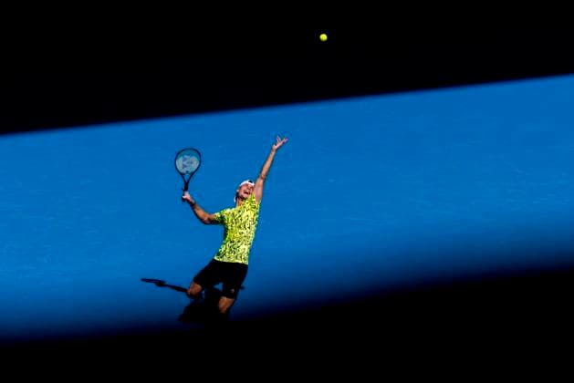 MELBOURNE, VIC - JANUARY 20: Marton Fucsovics of Hungary in action during Round 3 of the 2023 Australian Open on January 20 2023, at Melbourne Park in Melbourne, Australia. (Photo by Jason Heidrich Icon Sportswire) TENNIS: JAN 20 Australian Open Icon230120038