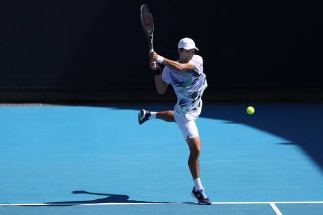 TENNIS AUSTRALIAN OPEN, Mackenzie McDonald of the USA in action during his 3rd round match against Yoshihito Nishioka of Japan at the 2023 Australian Open tennis tournament at Melbourne Park in Melbourne, Friday, January 20, 2023. ( NO ARCHIVING, EDITORIAL USE ONLY, NO USE IN BOOKS WITHOUT CONSENT MELBOURNE VICTORIA AUSTRALIA  Copyright: xDIEGOxFEDELEx 20230120001754628990