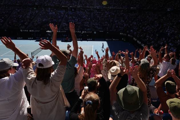 Crowd doing Mexican wave at Rod Laver Arena during the round 3 match between Alex de Minaur of Australia and Benjamin Bonzi of France, Day 6 at the Australian Open Tennis 2023 at Rod Laver Arena, Melbourne, Australia on 21 January 2023. Copyright: xPeterxDovganx 34781443