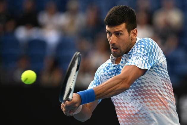 TENNIS AUSTRALIAN OPEN, Novak Djokovic of Serbia in action during his match against Grigor Dimitrov of Bulgaria during the 2023 Australian Open tennis tournament at Melbourne Park in Melbourne, Friday, January 1, 2021. ( NO ARCHIVING, EDITORIAL USE ONLY, NO USE IN BOOKS WITHOUT CONSENT MELBOURNE VICTORIA AUSTRALIA  Copyright: xLUKASxCOCHx 20230121001755012913