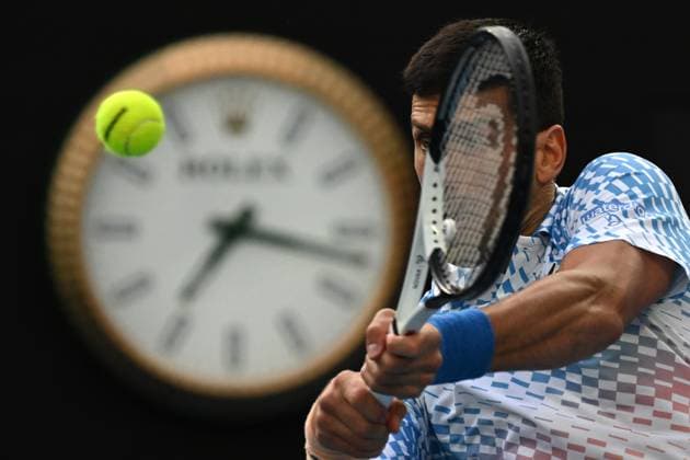 TENNIS AUSTRALIAN OPEN, Novak Djokovic of Serbia in action during his match against Grigor Dimitrov of Bulgaria during the 2023 Australian Open tennis tournament at Melbourne Park in Melbourne, Friday, January 1, 2021. ( NO ARCHIVING, EDITORIAL USE ONLY, NO USE IN BOOKS WITHOUT CONSENT MELBOURNE VICTORIA AUSTRALIA  Copyright: xLUKASxCOCHx 20230121001755013609